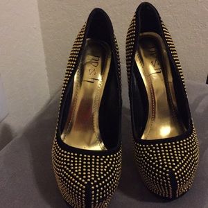 Gold and black heels
